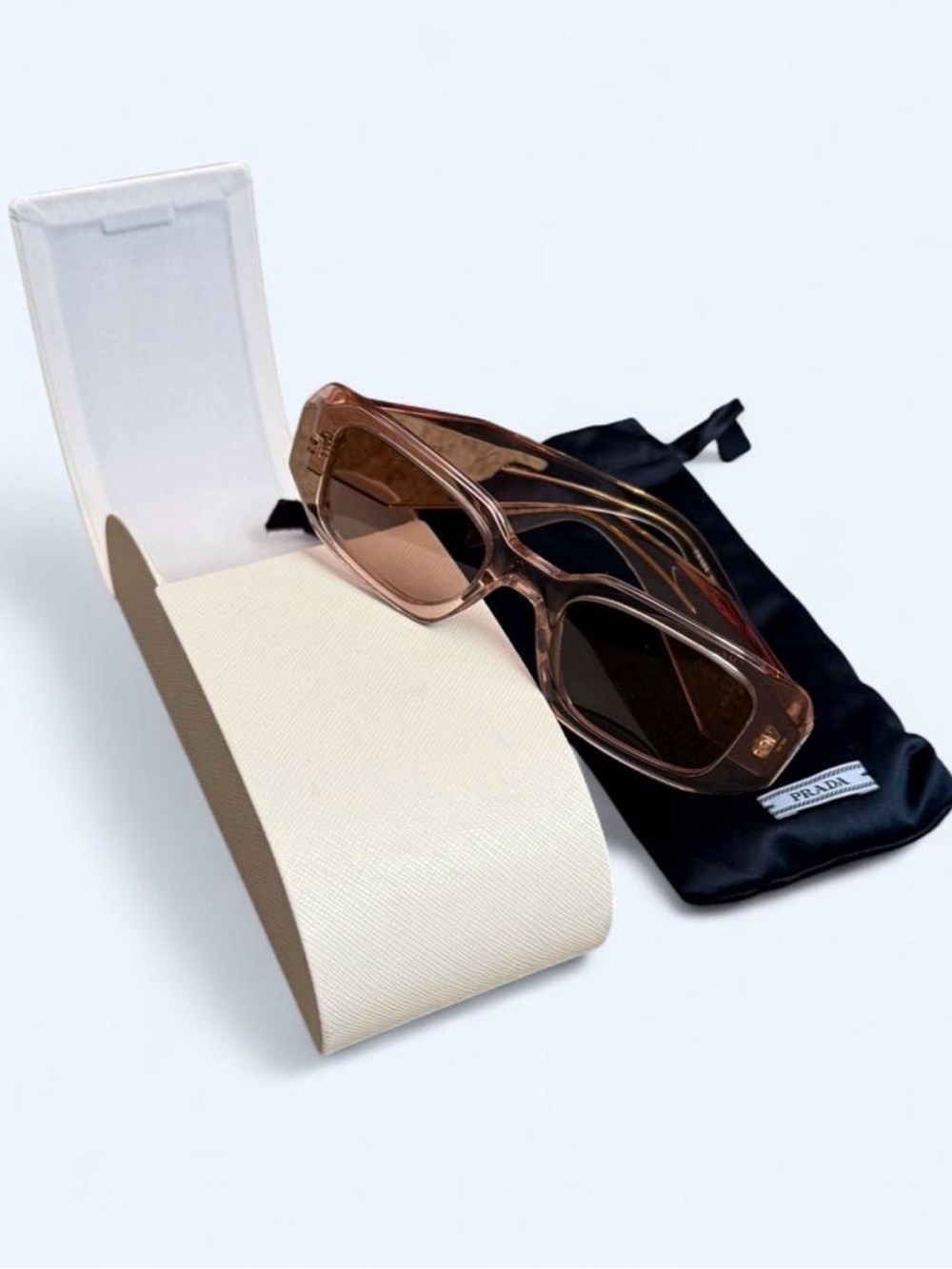 Prada Women’s Transparent Light Pink Rectangular Sunglasses